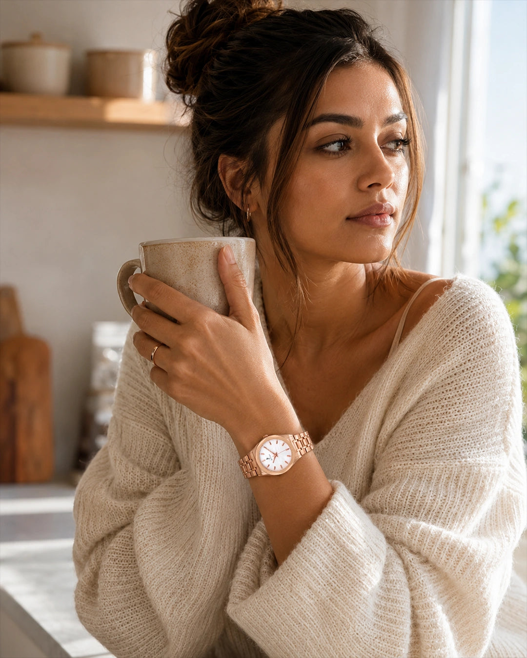 Woman wearing the Sylvi Sia rose-gold watch with a casual everyday outfit