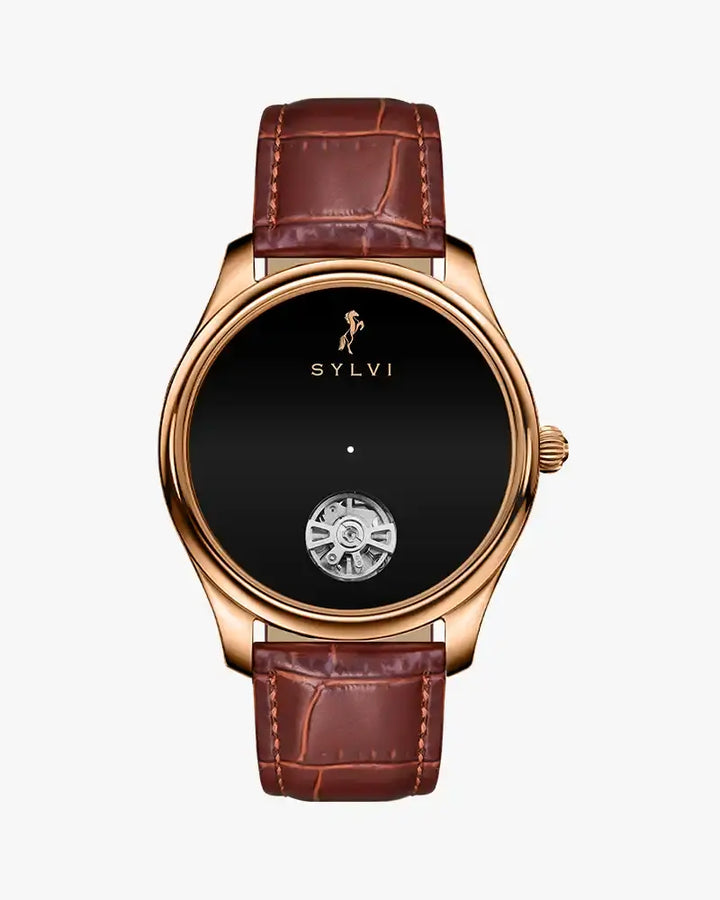 Sylvie watch with brown leather strap and black face on a white background