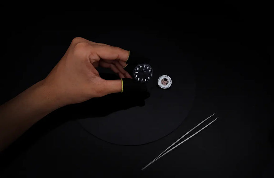 Ocean Y black red silver watch dial installation with balanced markers and clear design