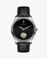 Sylvi watch with black leather strap and black face on a white background