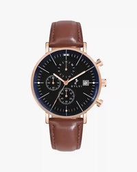 Wristwatch with brown leather strap and black dial on a white background