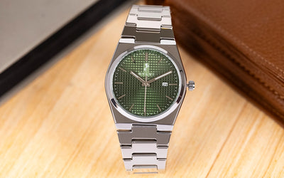 Sylvi Professional Edge Green Silver Metal Strap Analog Watch Front Angle Props Image
