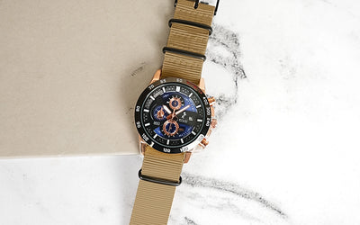 Sylvi Timegrapher Chronograph Blue Rosegold Watch with Khaki Nylon Strap Props Image