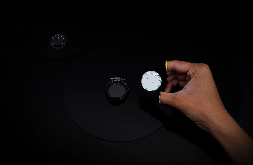 premium black steel watch case assembly precision detail