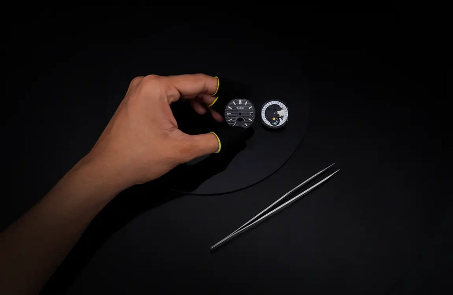 Urbane Moon black silver watch dial placement with refined layout and clear markers