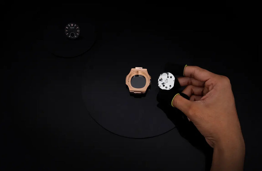Urbane Moon rosegold silver watch movement setup during manufacturing process