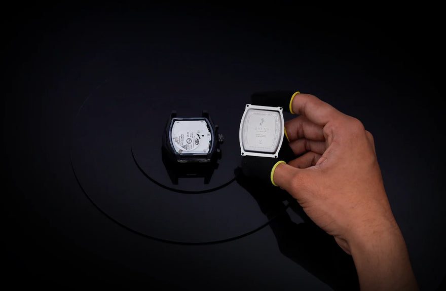Sylvi Vanguard all black silicone watch internal module and case back during assembly