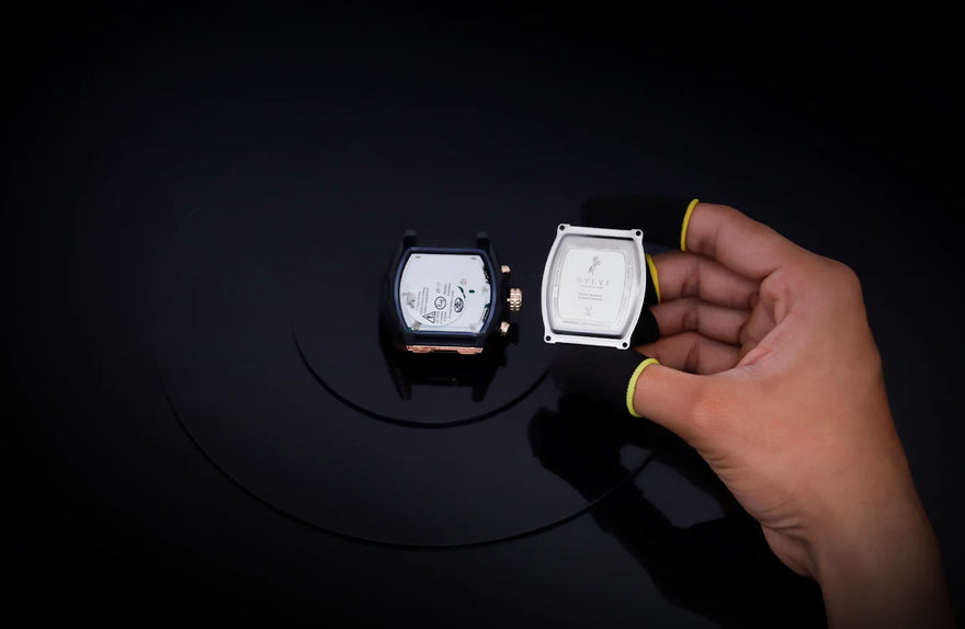Sylvi Vanguard black rosegold silicone watch internal movement and case back during assembly
