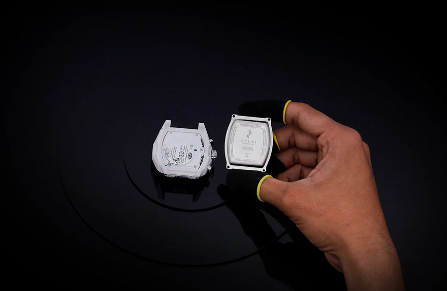 Sylvi Vanguard black white silicone watch internal movement and case back during assembly