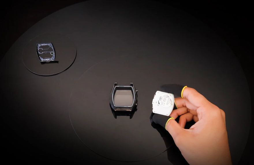 Sylvi Vanguard all black silicone watch back case installation in watch manufacturing process